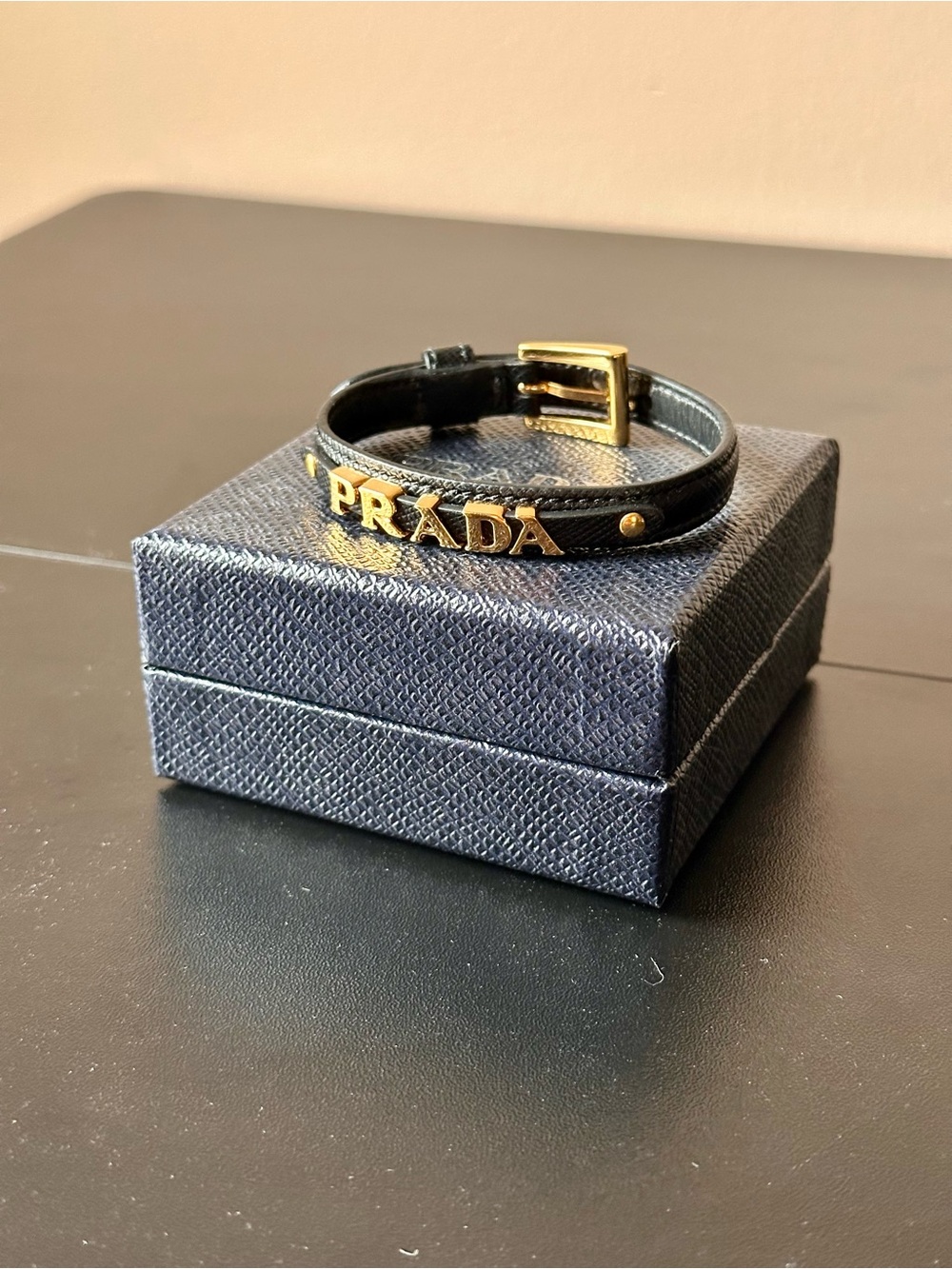 Prada Black Leather Bracelet with Gold Logo and Buckle